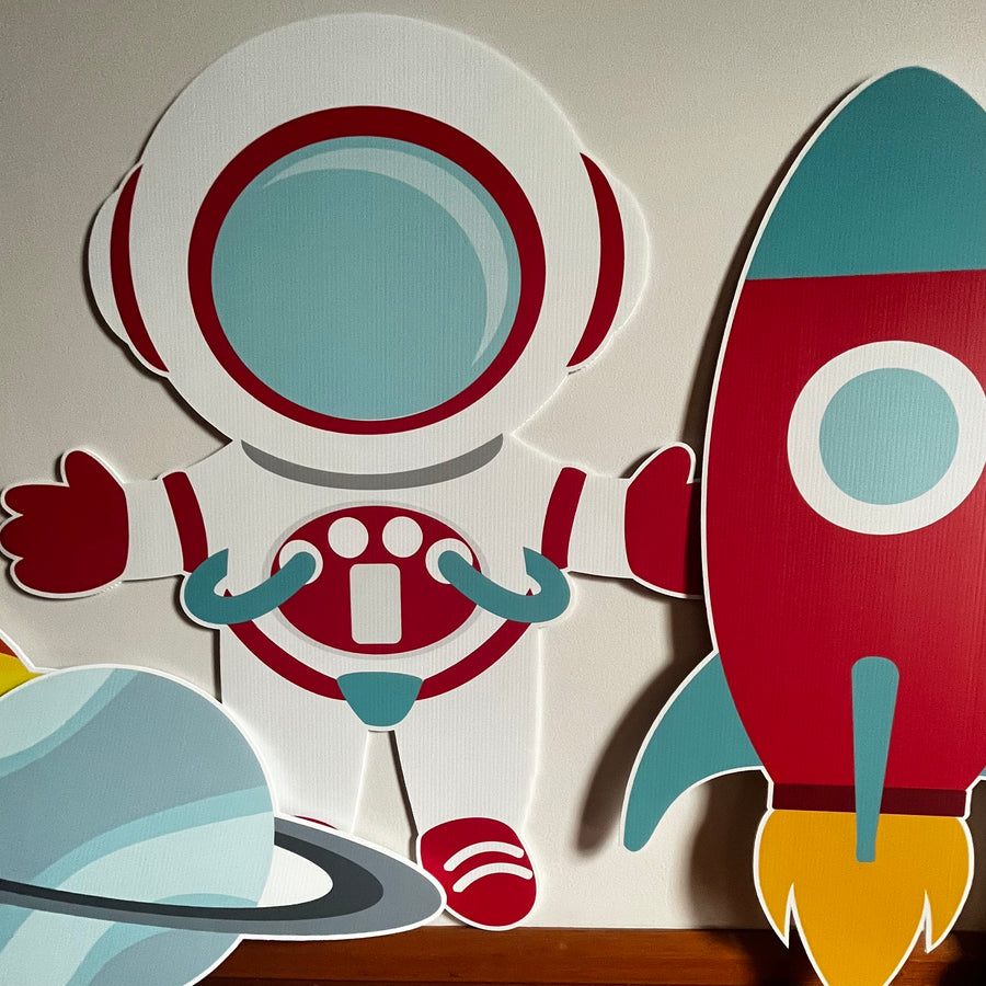 Custom space party cutouts with astronaut and rocket